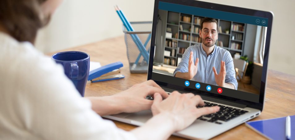 woman sitting at laptop