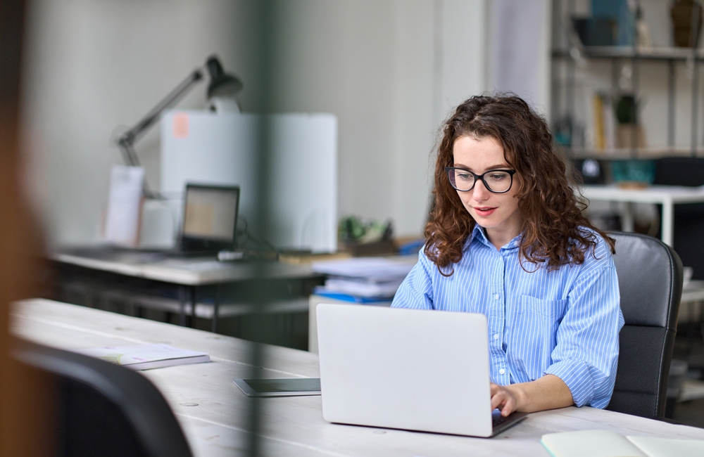 woman sitting at computer